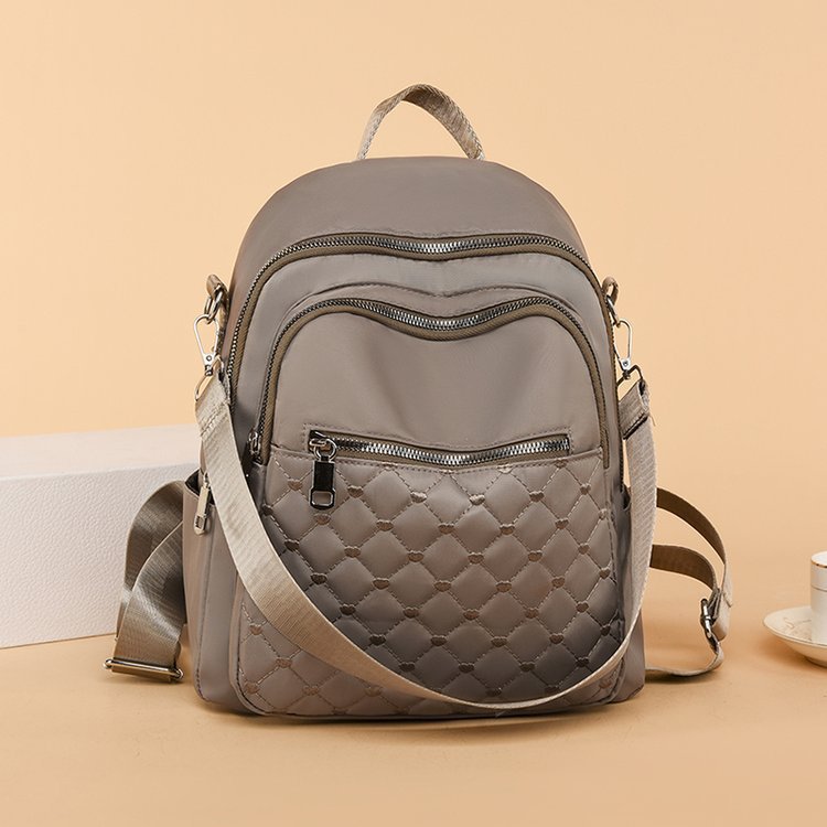 Primavera y verano nueva moda multifuncional de doble uso un solo hombro y doble hombro bordado estilo universitario deportes al aire libre tiro real bolso femenino al por mayor