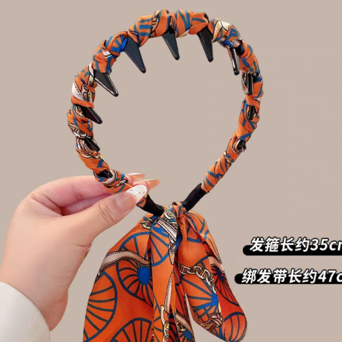 # 170 orange flower wavy hairband