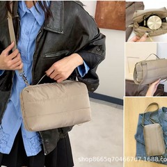 小众设计羽绒包蓬松斜挎水壶包大容量户外雨伞收纳单肩包水瓶包女