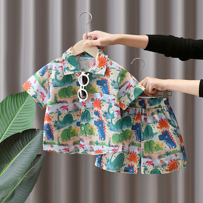 7182 Traje de camisa de dinosaurio para niños 2025 nuevo estilo estilo occidental verano de manga corta ropa de dibujos animados ropa de verano Han Fan para niños