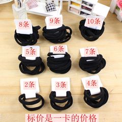 一枚の複数のひものタオルの輪の黒色の継ぎ目がない弾力性のタオルの輪は髪の毛の皮の筋を刺して大量に卸売りします。