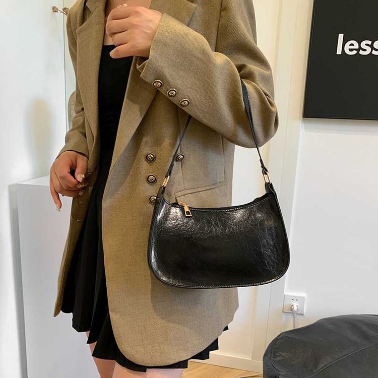 Niche Zhong retro bolso de braza, bolso de alta calidad, nuevo estilo de bolso de viaje, bolso de hombro de moda de gran capacidad.