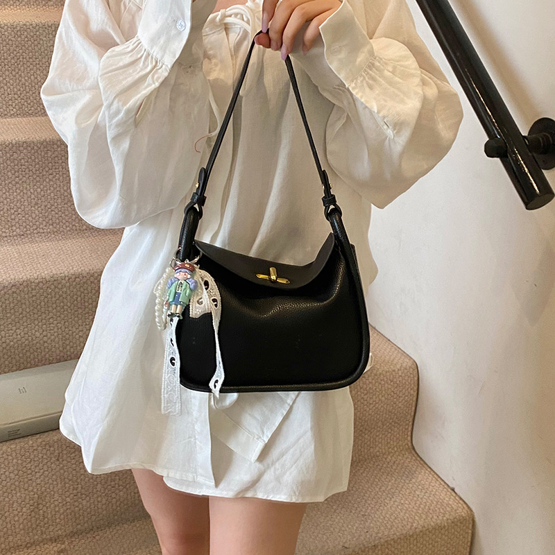 Bolso de brindis de diseño de nicho para mujer 2025 nuevo bolso de mano con patrón de lichi coreano, bolso de almohada de mensajero de un solo hombro