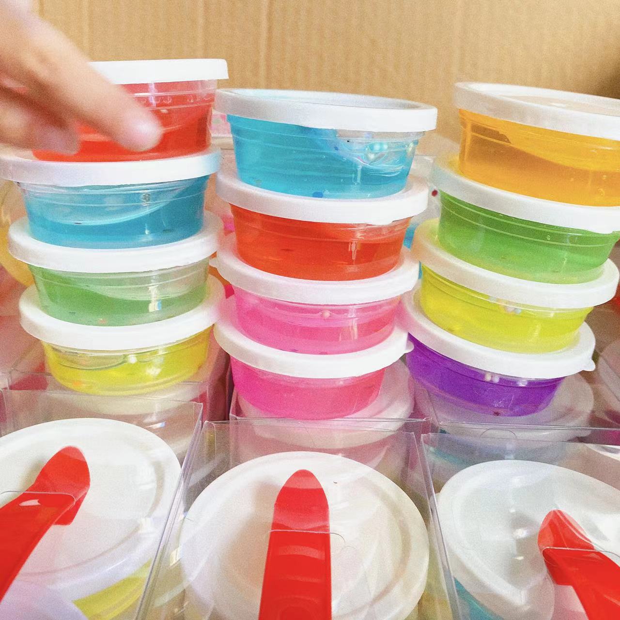 12 En Caja portátil traje cristal barro colorido color sólido cristal barro traje translúcido espuma pegamento en stock al por mayor