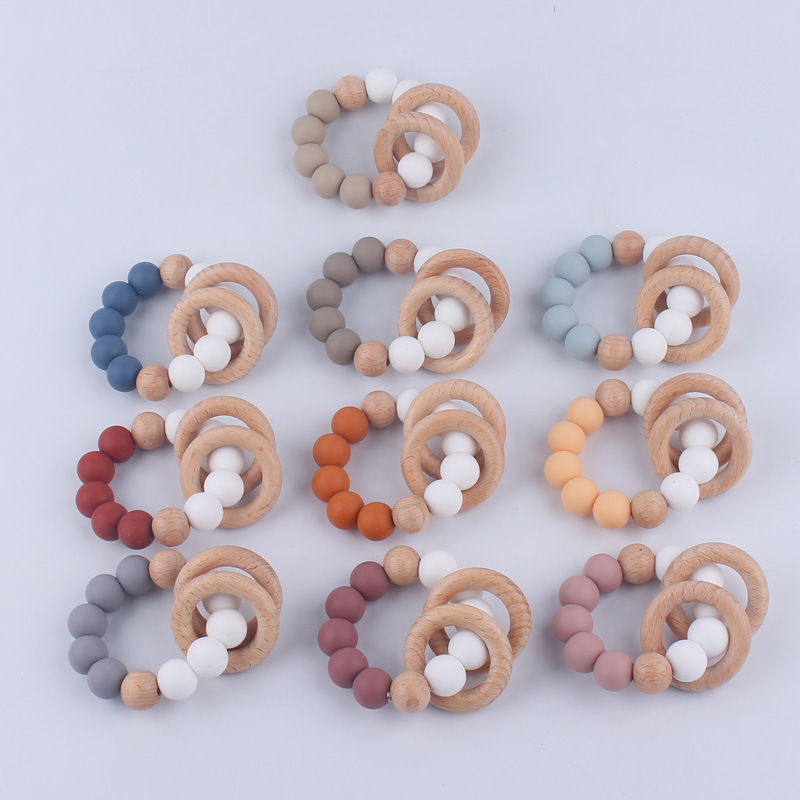 Nuevo bebé suministros mordedor pulsera creativa cuentas de silicona Beech anillo mordida molar pulsera mordedor juguete