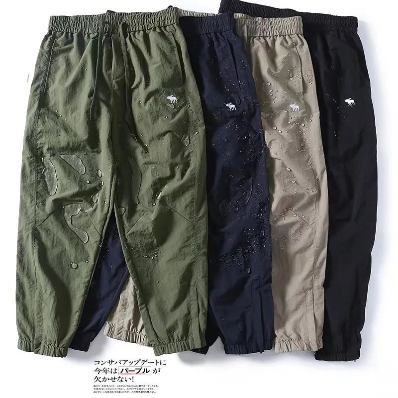Japanese single spring men's lightweight quick-drying waterproof functional overalls deer embroidered loose ankle-tied trousers fashion