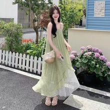 绿色森系碎花吊带连衣裙女夏2025新款法式海边度假雪纺不规则长裙