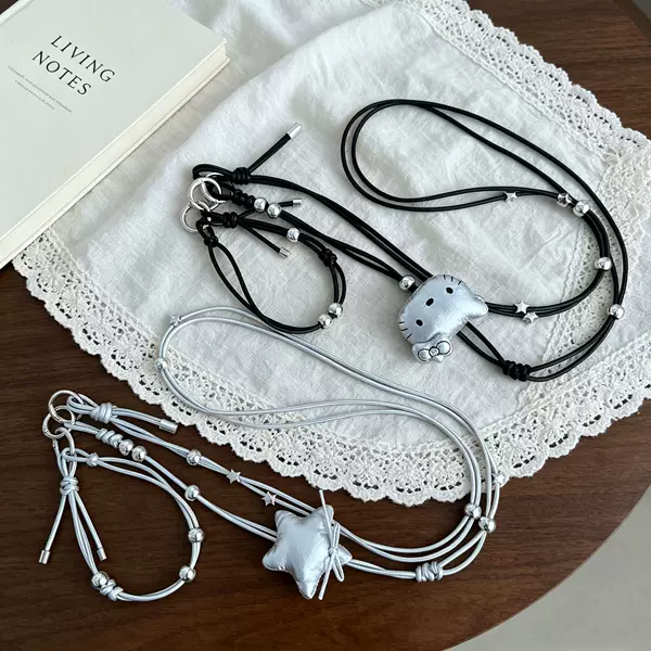Sweet and cool silver KT cat star long phone lanyard, double-layer leather strap, crossbody chain, bag accessory, available in multiple colors, wholesale