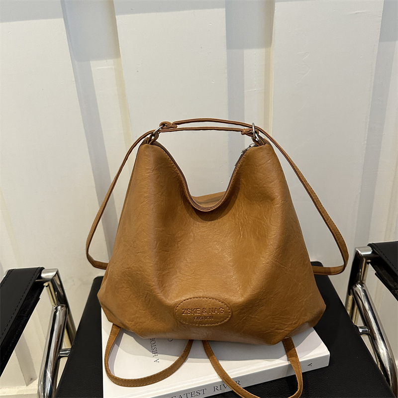 Gran capacidad de transporte popular ocio 2024 retro nuevo estilo de tendencia de color sólido multifuncional bolso de hombro para mujer