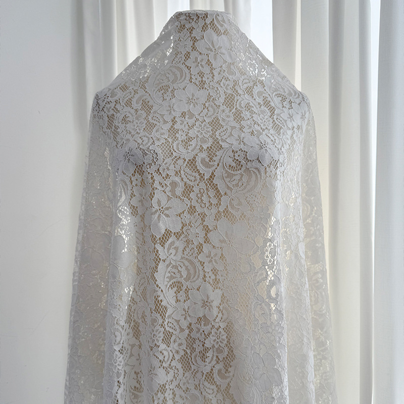 Tejido de encaje no elástico de algodón de brocado primavera y verano nuevo estilo vestido tirantes ropa de mujer tela fabricante spot