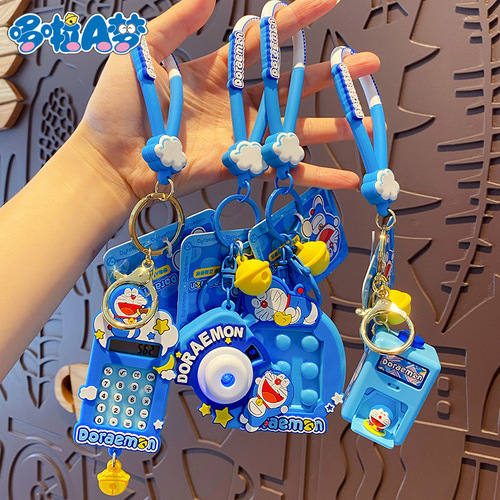 Genuine Doraemon projection camera keychain childhood memories jingle cat key chain ring car key pendant