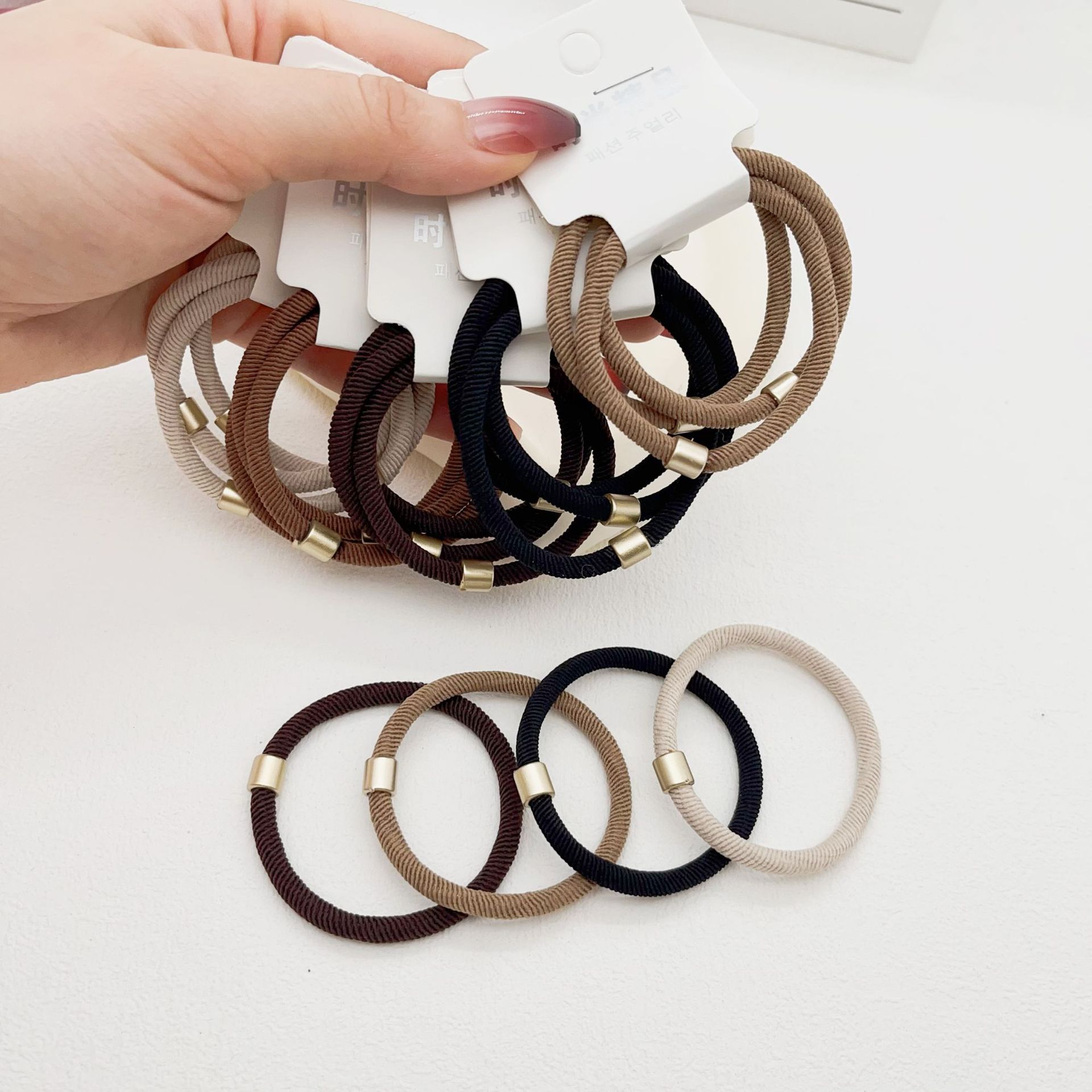 Dongdaemun estilo coreano hilo colorido accesorios para el cabello cuerda de pelo asequible banda de pelo de alta elasticidad de tres paquetes de banda de goma de dos yuanes tienda al por mayor image 13