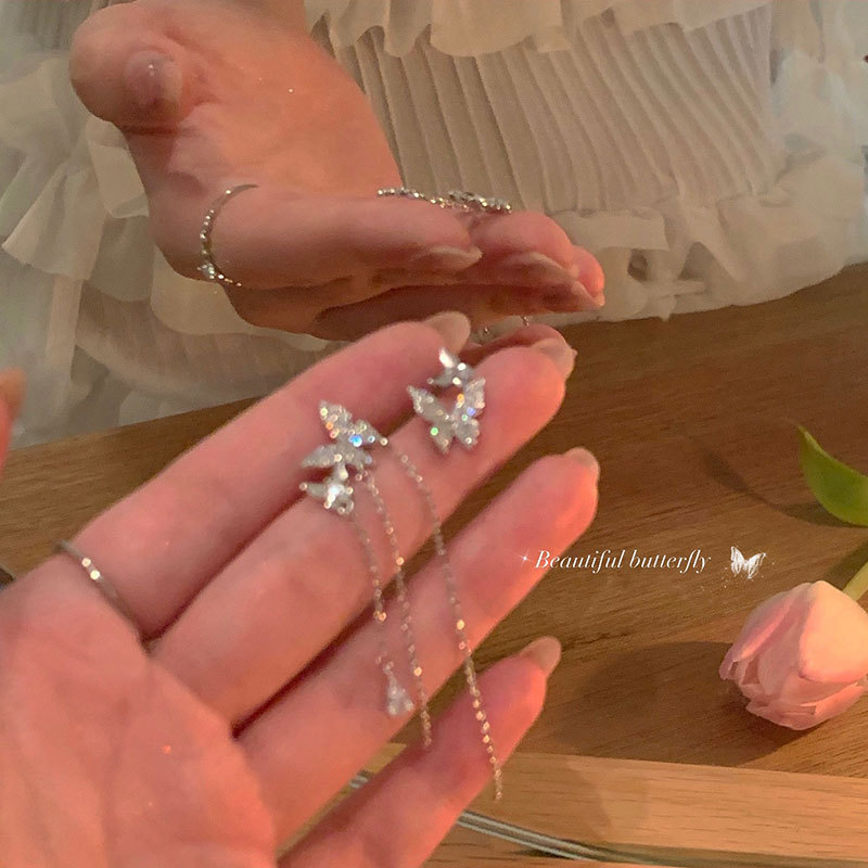 2025 estilos explosivos pendientes de mariposa de perlas para mujer, lujo ligero de nicho, pendientes de aguja de plata 925, joyería de pendientes al por mayor