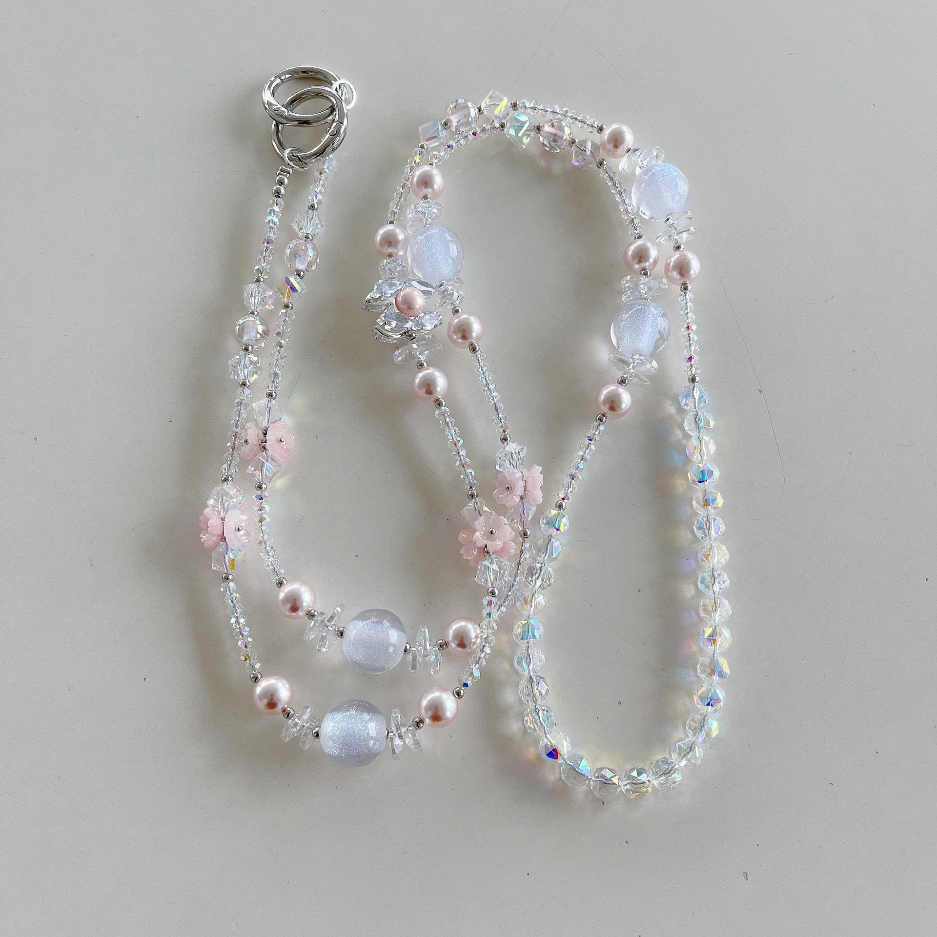 Boutique hecho a mano de alta gama para teléfono móvil cadena larga de cristal ins fresco cordón de teléfono móvil de moda colgante de mensajero largo