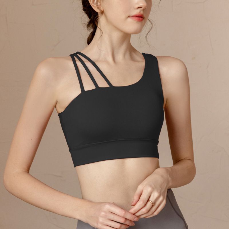 Women's yoga tank top with built-in bra, featuring a backless, asymmetrical shoulder design, a unique style suitable for wearing as outerwear, and ideal for sports, running, and fitness activities Women's yoga tank top with built-in bra, featuring a backless, asymmetrical shoulder design, a unique style suitable for wearing as outerwear, and ideal for sports, running, and fitness activities
