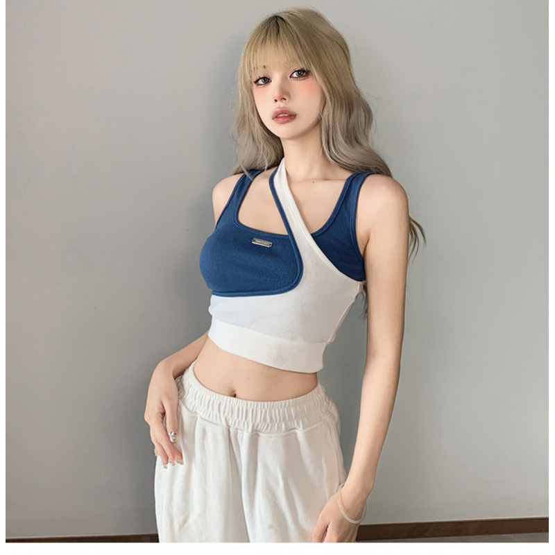 ギャルのベストの女性団風のジャズダンスの修身の短いタイプの臍を露出して踊る上着は色の偽の2つの不規則な外着にぶつかります。