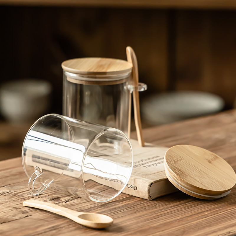 Hogar con cuchara, tanque de almacenamiento, frasco de bocadillos a prueba de humedad, tanque de té, tanque de almacenamiento de cocina transparente con tapa al por mayor