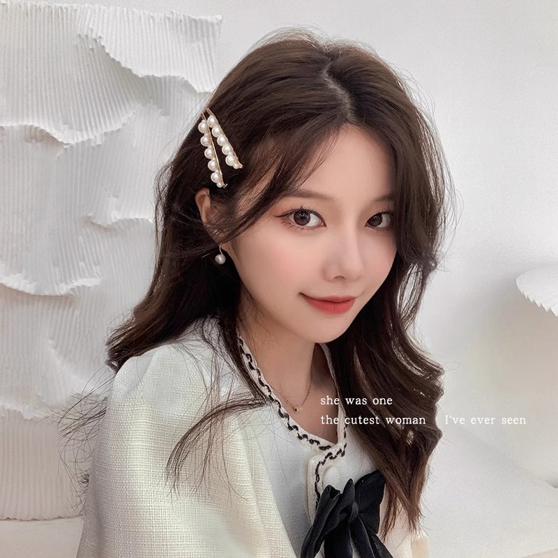 Pequeño clip de cabello de perla clip de cabello de mujer nuevo clip lateral de alta gama exquisita adornamiento para el cabello al por mayor