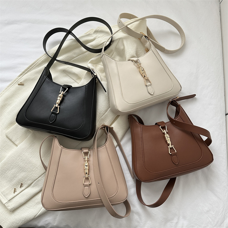 Bolsa de axilas bolsa de textura para mujer verano 2023 nuevo diseño de moda bolsa de mensajero bolsa de palo francés bolsa de hombro simple