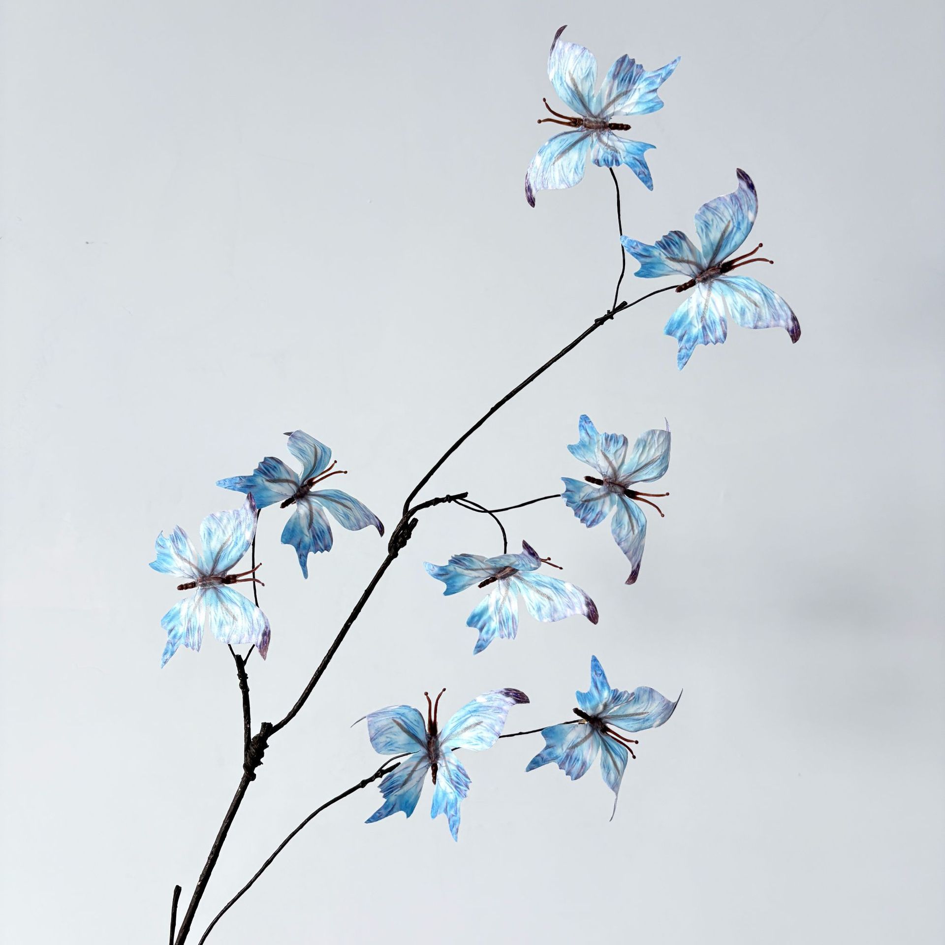 8 mariposas azules 83cm 28g