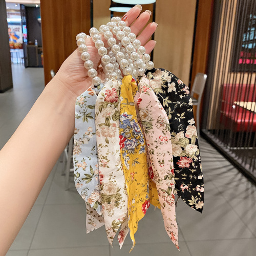 South Korean new pearl rope hair bands broken flower bow hair ribbon hair rope han edition: tire wholesale