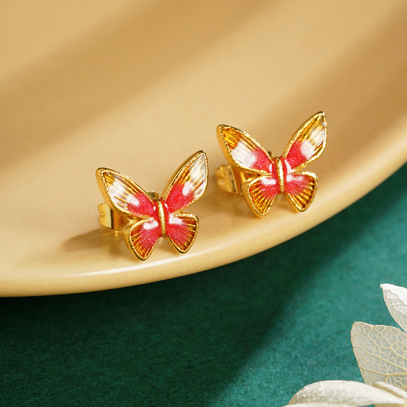 E2411 pendientes de mariposa graduadas