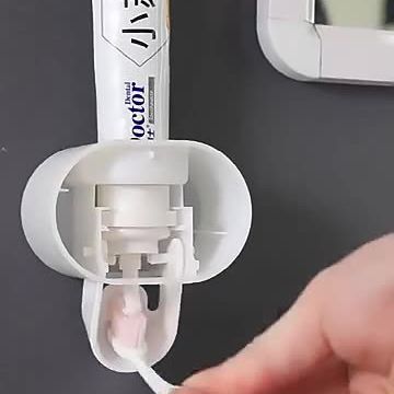 Fully automatic toothpaste squeezer wall-mounted punch-free toothpaste storage rack lazy toothpaste squeezer live supply