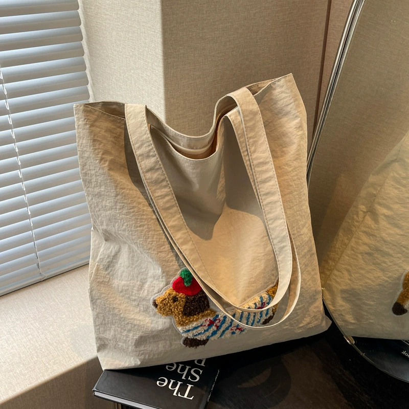 Новая популярная сумка через плечо с вышивкой собаки, корейская версия, универсальная легкая сумка-тоут, студенческая портативная сумка для хранения подмышками для женщин