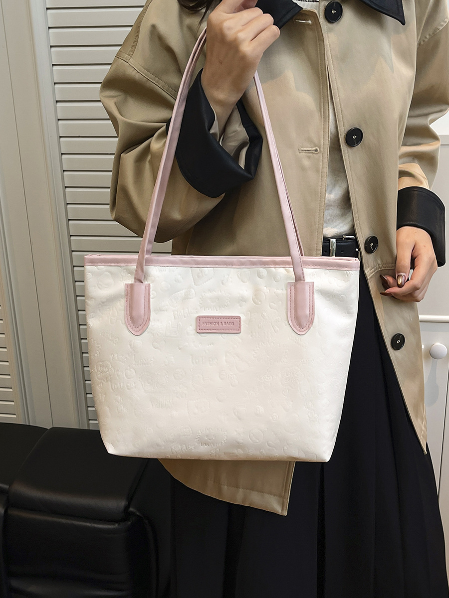 Gran capacidad de venta en caliente bolso para mujeres 2026 nuevo estilo simple universal de viaje bolso de hombro bolso de mano bolso de moda ocio