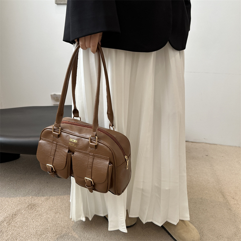 Bolso de bolera portátil de nicho retro para mujer 2024 otoño nuevo bolso de axila coreano de moda bolso de viaje de gran capacidad