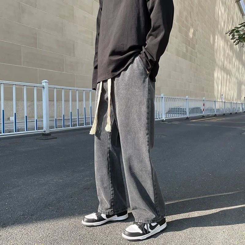 Jeans de cintura elástica de tamaño grande, pantalones rectos de primavera y otoño, pantalones sueltos retro, nuevos pantalones de moda de estilo americano de Hong Kong.