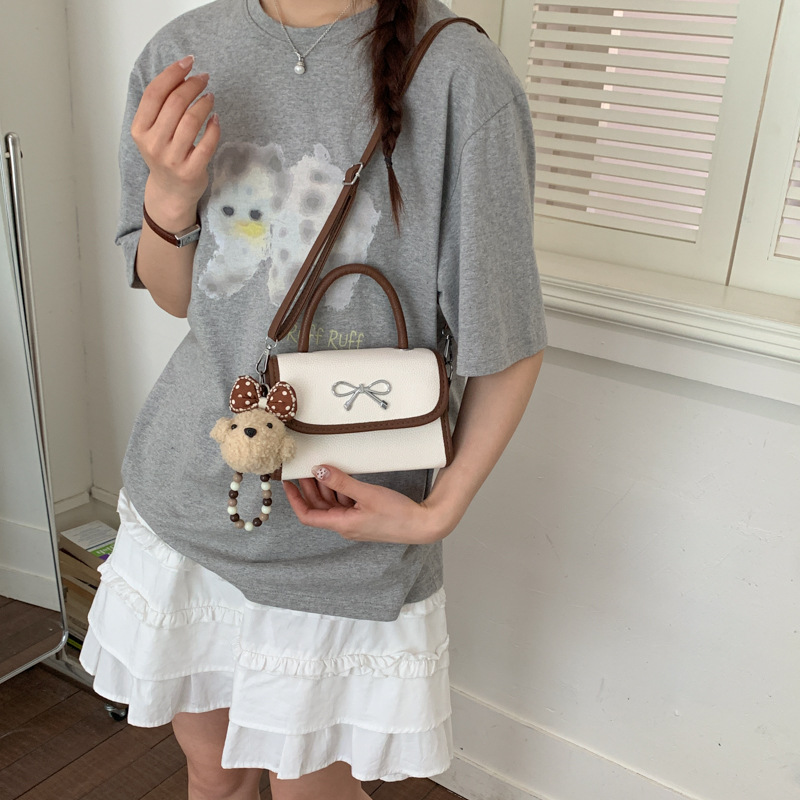 Bolso de arco rosa portátil para mujeres 2026 nuevo bolso de hombro de verano popular bolso de moda lindo
