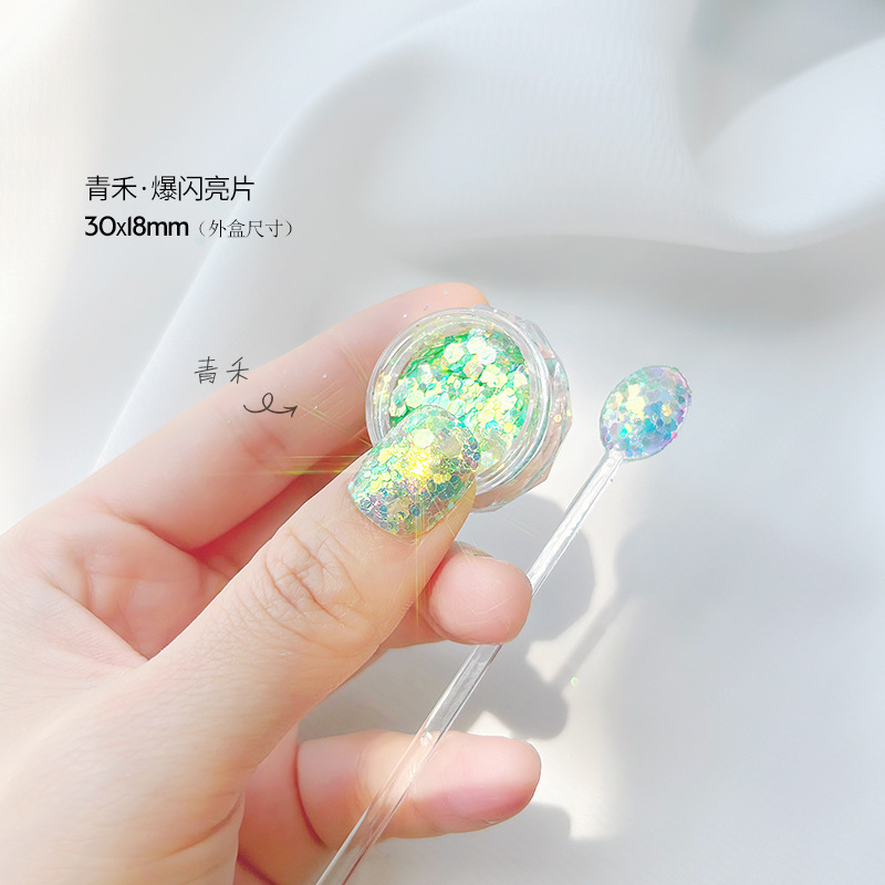 Internet celebridad nuevo clavo ultra-delgada flor de cerezo verde mariposa láser lentejuelas brillo gradiente mezclado joyería de uñas