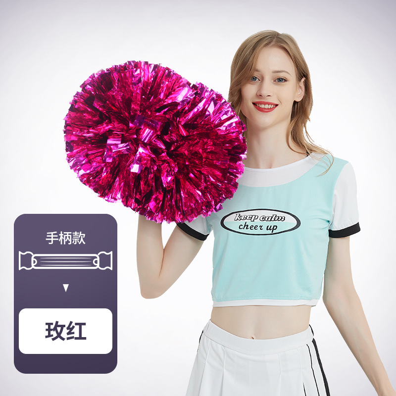 Flor bola de la flor porristas bola de la flor de la mano que sostiene la flor juegos de deportes mano que sostiene apoyos alegría apoyos en stock
