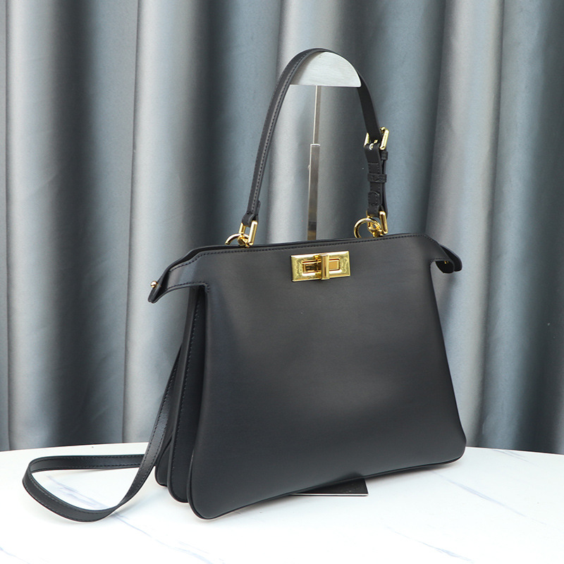 24 otoño e invierno nueva bolsa de bolso de mujer PB tamaño medio bolsa de gatito de cerradura de metal de lujo ligero bolsa de cuero bolsa axila de un solo hombro