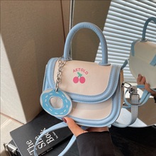 夏季上新潮流个性2025新款拼色可爱印花清新洋气手提单肩斜挎包女