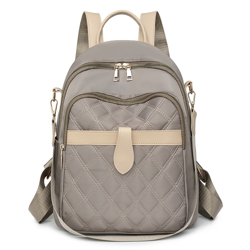 Mochila para mujer 2024 nueva mochila de viaje de ocio de nailon de la moda coreana de todo fósforo