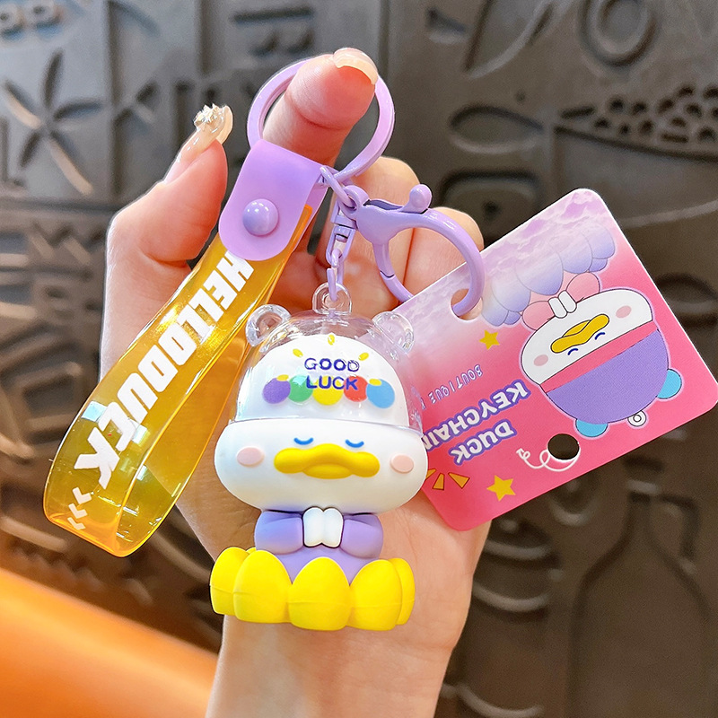 Creativo nuevo toque budista patito llavero lindo bolso colgante llavero de automóvil pequeño regalo al por mayor image 8