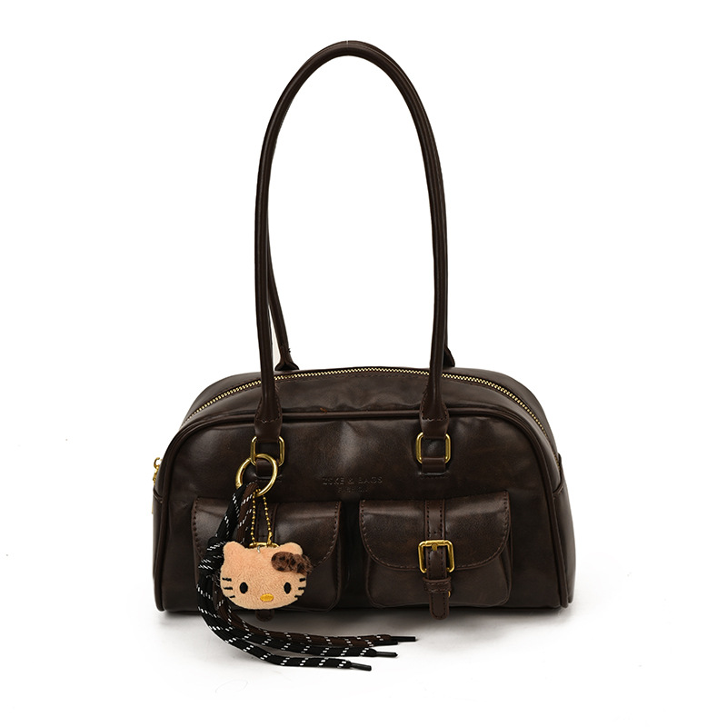Bolsa de almohada portátil simple coreana transfronteriza para mujeres otoño / invierno 2025 nuevo retro versátil bolso de hombro bolso de brazo de viaje