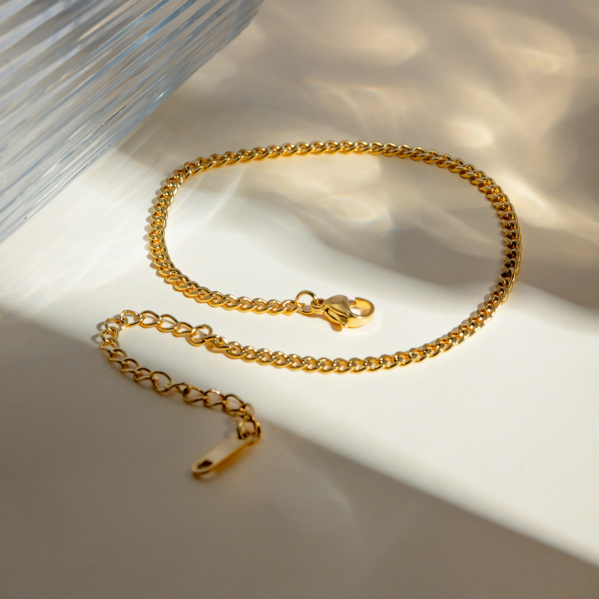 Europa y los Estados Unidos transfronterizos INS estilo clásico refinado simple 18 quilates oro acero inoxidable Cuba 3mm ancho joyería tobillaría al por mayor mujer