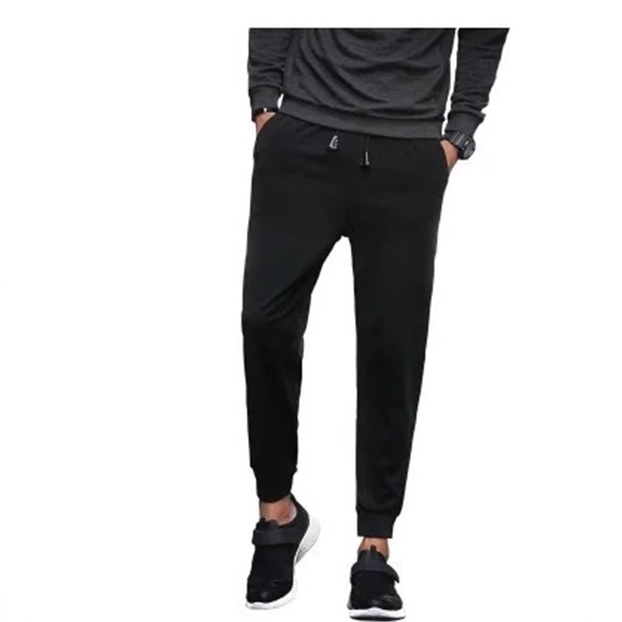 Pantalones deportivos casuales de primavera y otoño para hombres pantalones de chándal pantalones harén flacos pantalones atados al tobillo Pantalones slim fit hombres de moda coreana