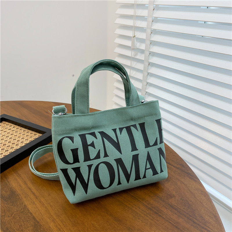 Venta al por mayor transfronteriza GW Tailandia Xiaoyou bolsa de lona diseño de nicho carta portátil de gran capacidad bolsa de mensajero del hombro