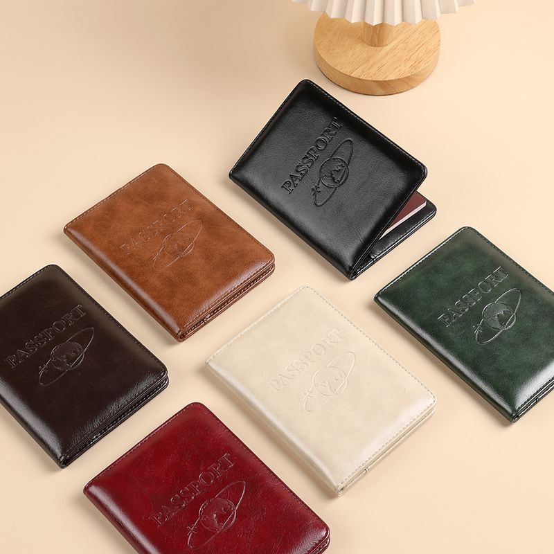 La nueva cubierta protectora de pasaporte retro de gama alta RFID antirrobo pasaporte pasaporte bolsa de identificación masculina billetera tarjeta antimagnética