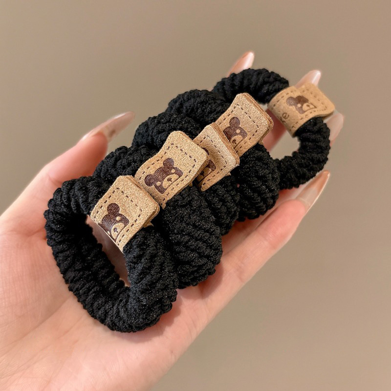 Banda de goma desechable negra corbata de pelo de mujer pequeña cubierta de cuero de alta elasticidad duradera no lastimar cuerda de pelo corbata de pelo banda de pelo verano