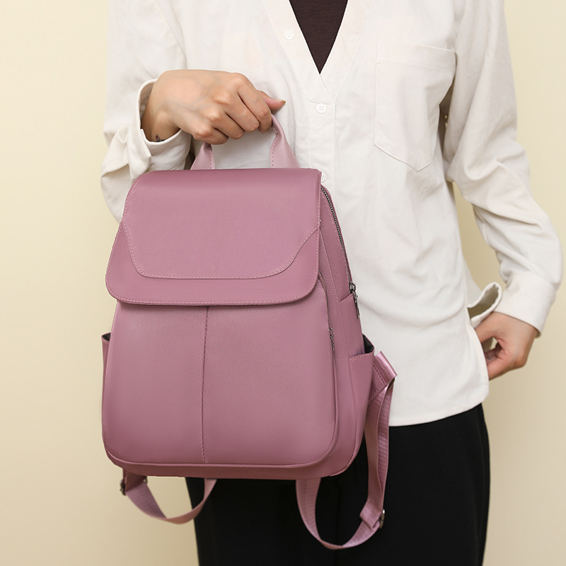 Mochila de tela Oxford para mujer 2024 nueva moda moda color sólido pu gran capacidad mochila escolar para estudiantes mochila de viaje para mujer