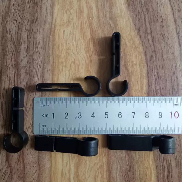 Specializing in the Production and Supply of Various Types and Specifications of Plastic Hooks, Safety Helmet Clips, Mining Lamp Straps, Fixed Clips, and Keychains