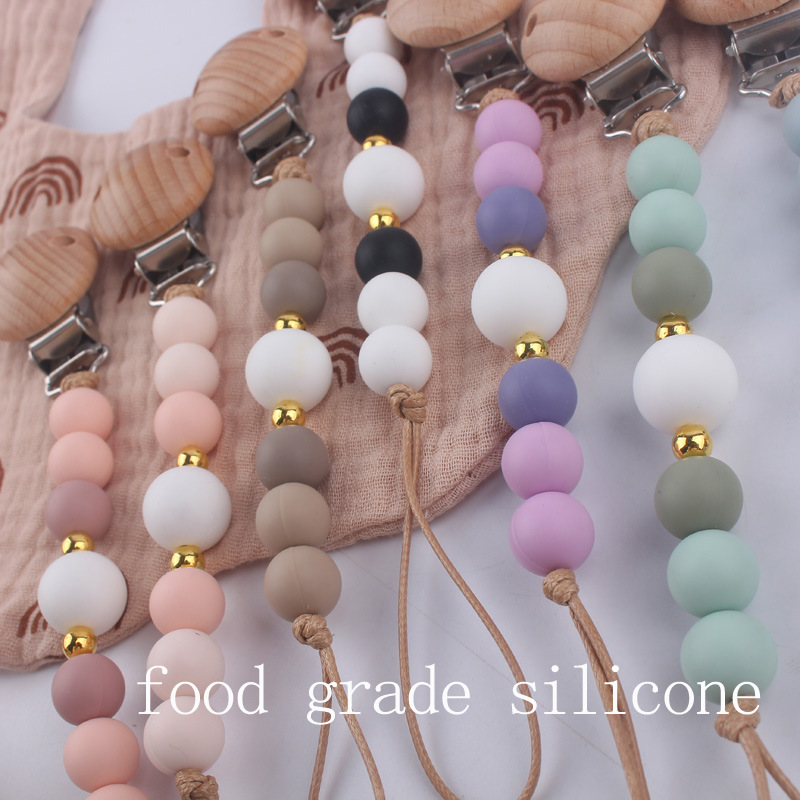 Nuevos suministros para bebés Beech clip calmante bebé DIY cuentas de silicona mordedura molar Cadena de pezón cadena anti-caída