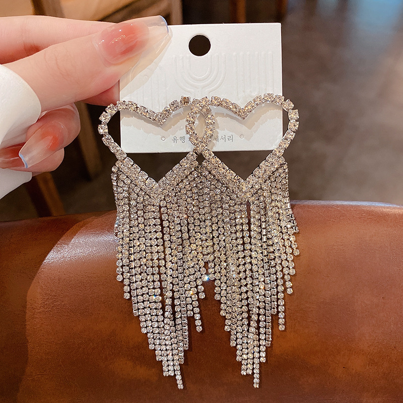 Agujas de plata transfronterizas flores de zircón aretes de bordillo estilo de moda pernos de auriculares lujosos de alto nivel de diseño de auriculares nicho