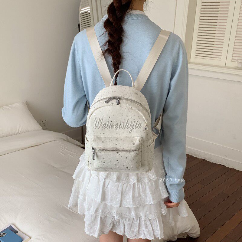 Mochila de moda mochila 2026 mochila de gran capacidad para estudiantes universitarios en clase nueva primavera bolsa de letras lienzo para mujeres
