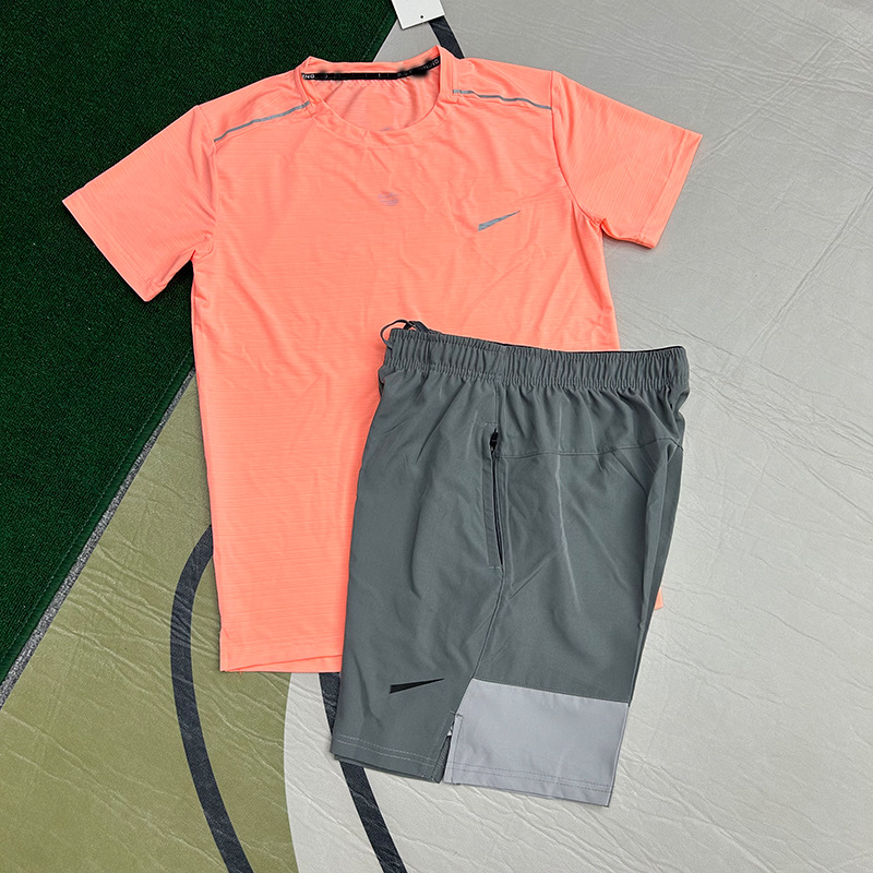 Mayorista nuevo juego de comercio exterior deportivo fitness juego de carrera rápida secado transpirable suelto ocio pantalones cortos de manga corta ropa de hombre